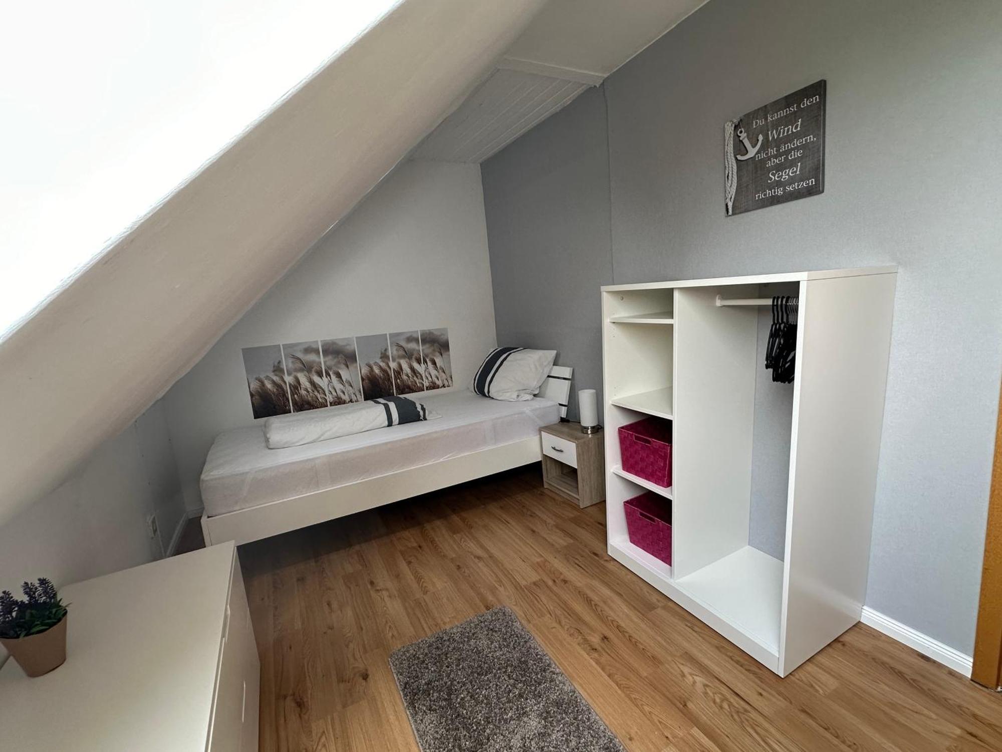 Rosenhaus Esens - Wohnung Backbord Bagian luar foto